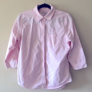 Button up pink shirt.